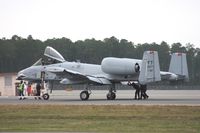 81-0967 @ NIP - A-10 being towed off of the runway after blowing a tire on landing - by Florida Metal