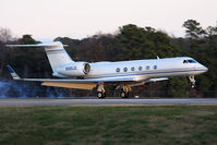 N585JC @ ORF - Hilton Hotels Corporation's 2000 Gulfstream G-V N585JC from The Florida Keys Marathon Airport (KMTH) landing RWY 23 just before sunset.  Used the call-sign Jet Speed 585 while communicating with ATC. - by Dean Heald