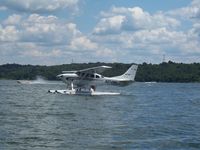 N214MH - Landed next to our boat on Brookville Lake, IN summer of 2004.  Beautiful aircraft! - by Edward Bird