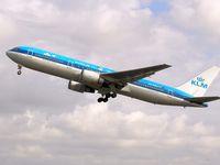 PH-BZA @ AMS - Take off from runway 36L of Schiphol Airport 
(In the colours with the Swan) - by Willem Goebel