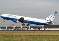 N657UA @ EHAM - Take off from runway 24 of Schiphol Airport - by Willem Goebel