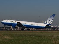 N647UA @ EHAM - Take off from runway 36L of Schiphol Airport - by Willem Goebel