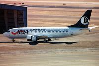 N329AW @ KPHX - Being prepared for lease to Shandong Airlines of China. Taken in 2001 - scanned from a print. - by John Meneely