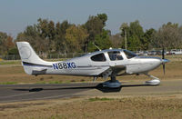 N88XG @ KTLR - Very sharp NXGEN a Transaction Company (Whitefish, MT) 2010 Cirrus Design SR22 taxis for take-off @ Tulare, CA after visit to nearby World Ag Expo - by Steve Nation