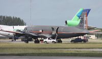 N381AA @ OPF - DC-7 in American colors
