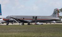N381AA @ OPF - DC-7 in American colors - by Florida Metal