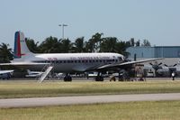 N836D @ OPF - Eastern DC-7 - by Florida Metal