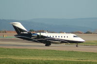 G-URRU @ EGCC - Bombardier Cl-600-2b16 taxiing Manchester Airport. - by David Burrell