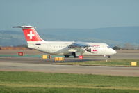 HB-IXT @ EGCC - Swiss HB-IXT British Aerospace Avro 146 RJ-100 Taxiing Manchester Airport. - by David Burrell