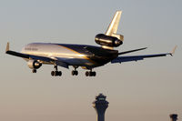 N274UP @ KORD - Just about to touchdown on 28 - by John Meneely