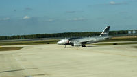 N516NK @ RSW - Airbus 319 taxiing for take off at RWY 06 - by Mauricio Morro