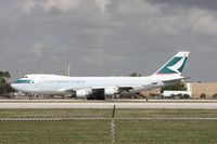 B-LIB @ MIA - Wind shifted again (5th and final time) and Runway 9 now open, means I could get Cathay departing from El Dorado Furniture - by Florida Metal