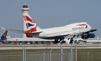 G-CIVD @ MIA - British 747 with tower and Cargo City in the background - by Florida Metal