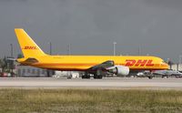 HP-1910DAE @ MIA - DHL Aero Expreso 757 doing the unusual, departing on Runway 8R due to runway 9 being closed for morning maintenance - taken from photo holes on 25th St. - by Florida Metal