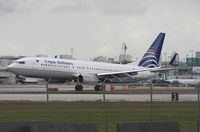 HP-1715 @ MIA - Copa 737-800 landing under cloud and wind shifting conditions Runway 27 - by Florida Metal