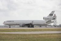 N275WA @ MIA - World Cargo MD-11F just landed on Runway 30 after wind shifted - taken from photo holes on 25th St. - by Florida Metal