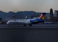 N415NV @ KLAS - Allegiant Air MD-82 in new colors, thrust reversing on RWY 7L - by Jonathan Ma