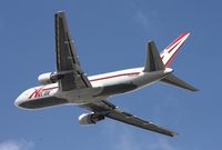 N750AX @ MIA - ABX 767 departing runway 27 - by Florida Metal