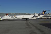 EI-DOU @ LOWW - Air One Regionaljet 900