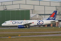 TC-OBH @ EGCC - Onur Air A320 now wearing 20th anniversary markings - by Chris Hall