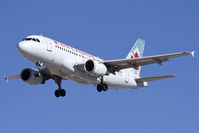 C-GARG @ LAS - Air Canada C-GARG (FLT ACA575) from Montreal Pierre Elliot Trudeau Int'l (CYUL) on short final to RWY 25R. - by Dean Heald