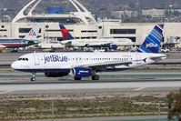 N784JB @ LAX - JetBlue Airways Blue Infinity And Beyond N784JB (FLT JBU673) from John F Kennedy Int'l (KJFK) exiting RWY 25L after landing.  - by Dean Heald
