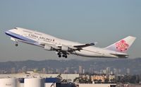 B-18207 @ KLAX - China Airlines 747 rockets out of LAX to Taipei - by Jonathan Ma