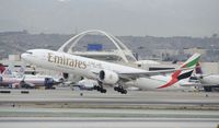 A6-ECU @ KLAX - Departing LAX - by Todd Royer