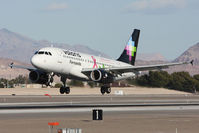 XA-VOP @ LAS - Volaris Fernando XA-VOP (FLT VOI960) with the breast cancer awareness scheme arriving to RWY 25L from Don Miguel Hidalgo y Costilla Int'l (MMGL/GDL) - Guadalajara, Mexico. - by Dean Heald