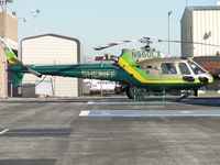 N960LA @ POC - Parked on LA Co Air Ops helipad 6 and rotor tied down - by Helicopterfriend