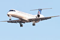 N15910 @ KORD - ExpressJet/United Express Embraer EMB-145LR, ASQ5853 arriving from KBVT, RWY 28 approach KORD. - by Mark Kalfas