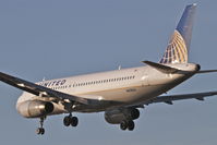 N458UA @ KORD - United Airlines A320-232, UAL478 arriving from KLAX, RWY 28 approach KORD. - by Mark Kalfas