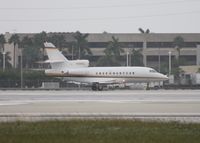 N10HZ @ MIA - Falcon 900EX departing Runway 8L right before the rain - by Daniel Compton