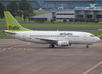 YL-BBN @ EHAM - Taxi to the gate of Schiphol Airport - by Willem Goebel