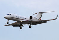 N460QS @ LAX - NetJets 1999 Gulfstream G-IV N460QS from Las Vegas McCarran Int'l (KLAS) on short final to RWY 25L in overcast conditions.