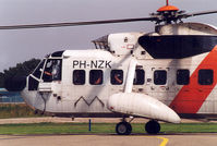 PH-NZK @ EHKD - Schreiner North Sea Helicopters , sightseeing Flights. Airport Open Day 2000 - by Henk Geerlings