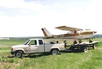N6772F - Being hauled away to Osceola Iowa to become my first airplane - by Floyd Taber