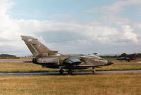 ZA562 @ EGQS - Tornado GR.1, callsign Mitre 2,  of 15(Reserve) Squadron awaiting clearance to join the active runway at RAF Lossiemouth in September 1994. - by Peter Nicholson