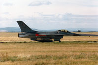 E-599 @ EGQS - F-16A Falcon of Eskradille 730 Royal Danish Air Force at Skrydstrup awaiting clearance to join the active runway at RAF Lossiemouth in September 1994. - by Peter Nicholson