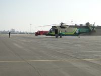 N950SB @ POC - Everything was clear and crew member giving signal to engage rotors - by Helicopterfriend