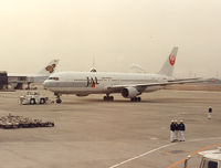 JA8299 @ ITM - Japan Airlines - by Henk Geerlings