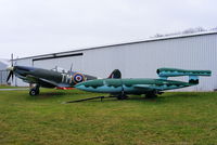 PL256 @ EGBG - Replica Spitfire formally displayed at the East Midlands Aeropark, now at Leicester alongside a Fiesler Fi.103 VI replica - by Chris Hall