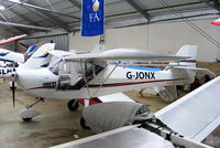 G-JONX @ EGBK - inside the Flylight Airsports hangar - by Chris Hall