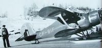 C-FBIF - Don Starratt beside his company's Staggerwing at the foot of 5th Ave in Sioux Lookout, Ontario. Date unknown. Photo courtesy of Don Starratt. - by Stephen B. Nicholson