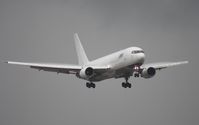 N763CX @ MIA - ATI 767 landing in rainy weather