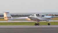 N373AM @ BKL - See taxiing to runway 6L for take-off at KBKL. - by aeroplanepics0112