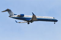 N709SK @ KORD - SkyWest/United Express Bombardier CL-600-2C10 on approach RWY 10 KORD. - by Mark Kalfas