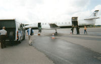 G-BUKA @ EGSS - During the Melanie C World Tour 2001 this aircraft was chartered to take us, the Band & Crew, from Stansted, UK to Turku, Finland for the Rock In The Quarry Festival. A journey of around 3 hours either way. Photo: Our gear is being loaded. - by RoadieJohn