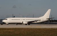 N870AG @ KMIA - Boeing 737-400 - by Mark Pasqualino