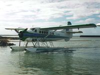 VH-OTR - Photograph by Edwin van Opstal with permission. Scanned from a color print. Taken at Cairns Seaplane Base - by red750